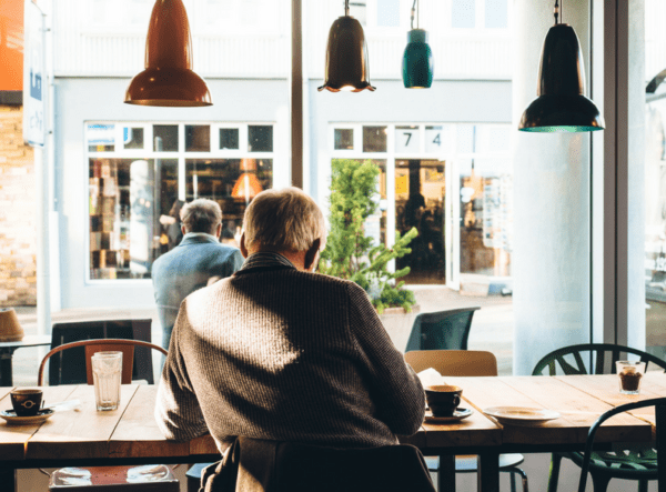 older man at a coffee shop