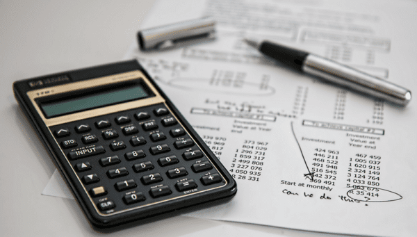 tax paperwork and calculator