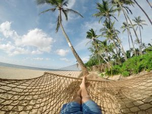 person relaxing at the beach